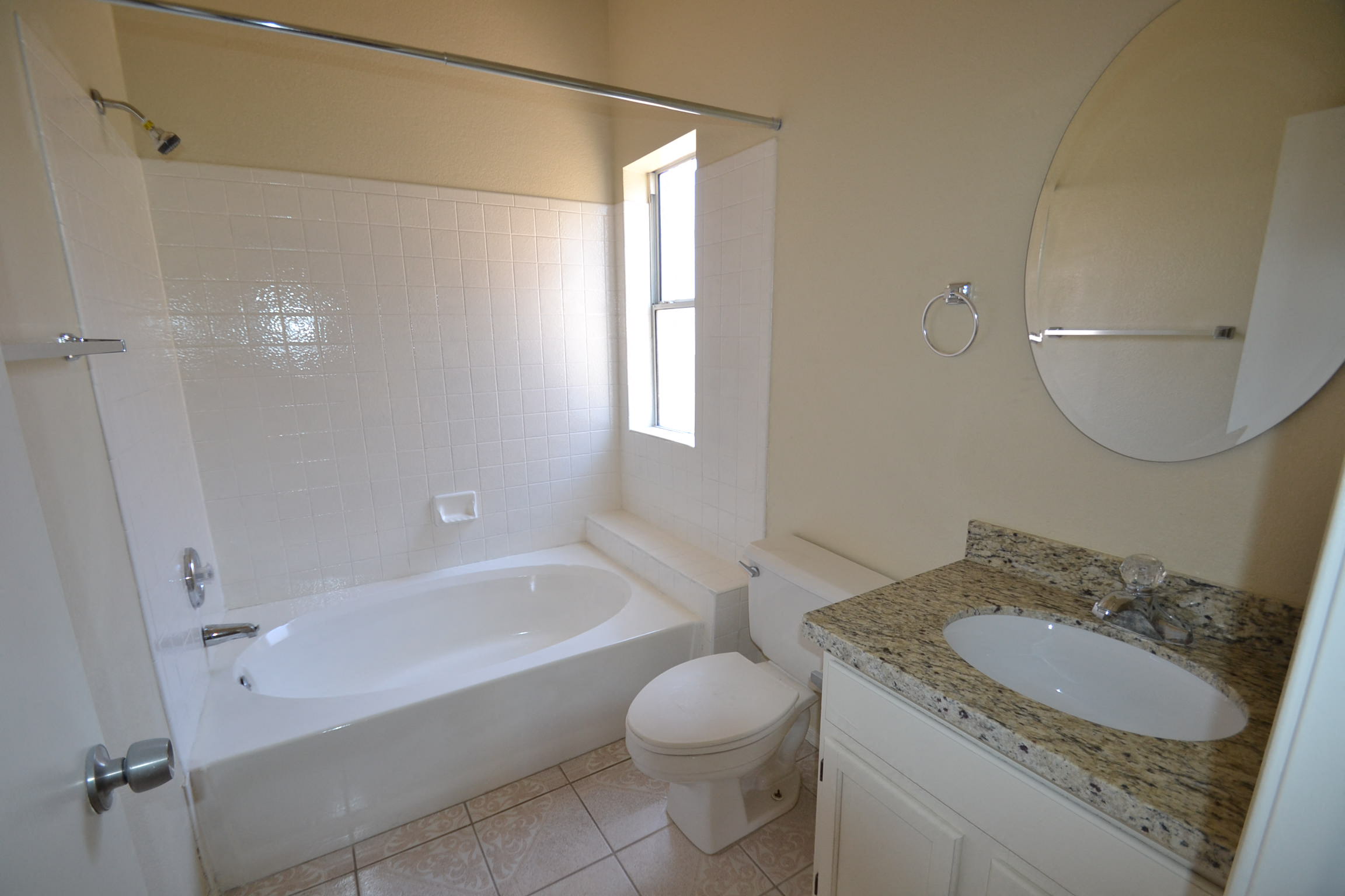 a bathroom with a sink toilet and a bath tub