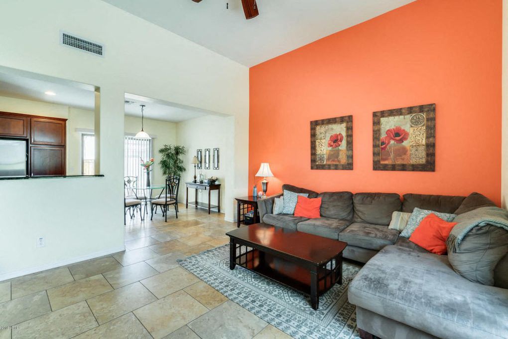 a living room with a couch and a table