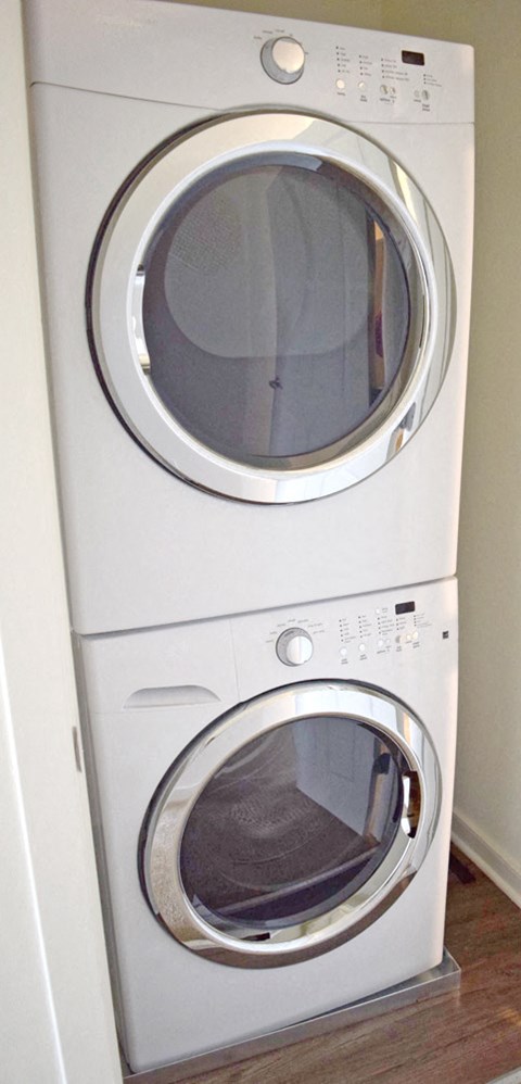 a washer and dryer stacked on top of each other