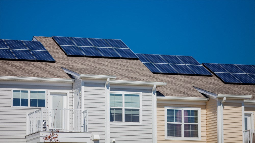 a house with solar panels on the roof