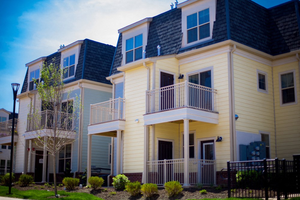 a row of houses with balconies