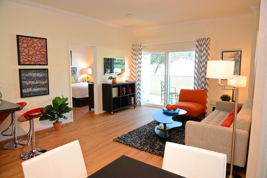 a living room with a couch and a table