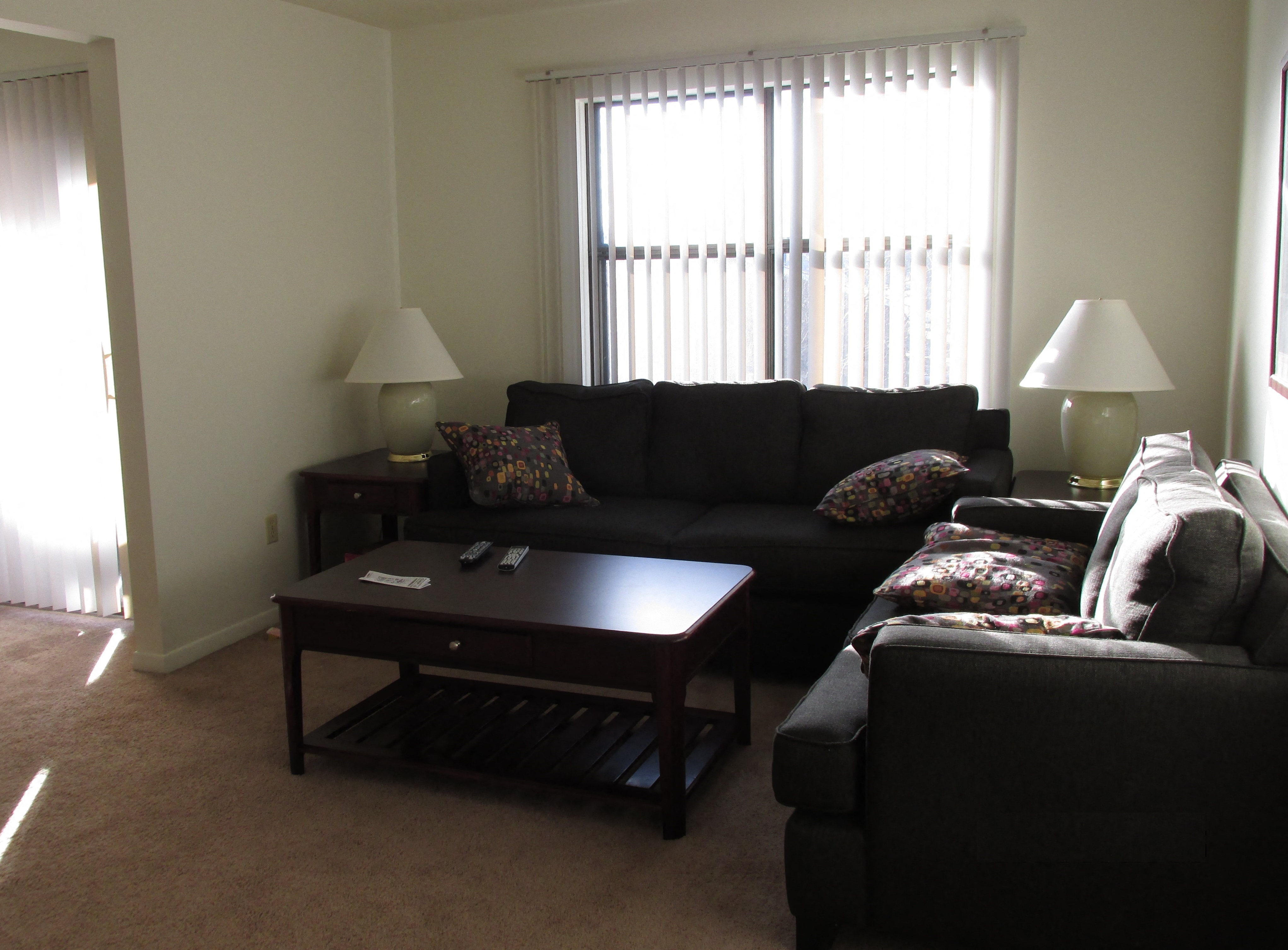 a living room with a couch and a coffee table