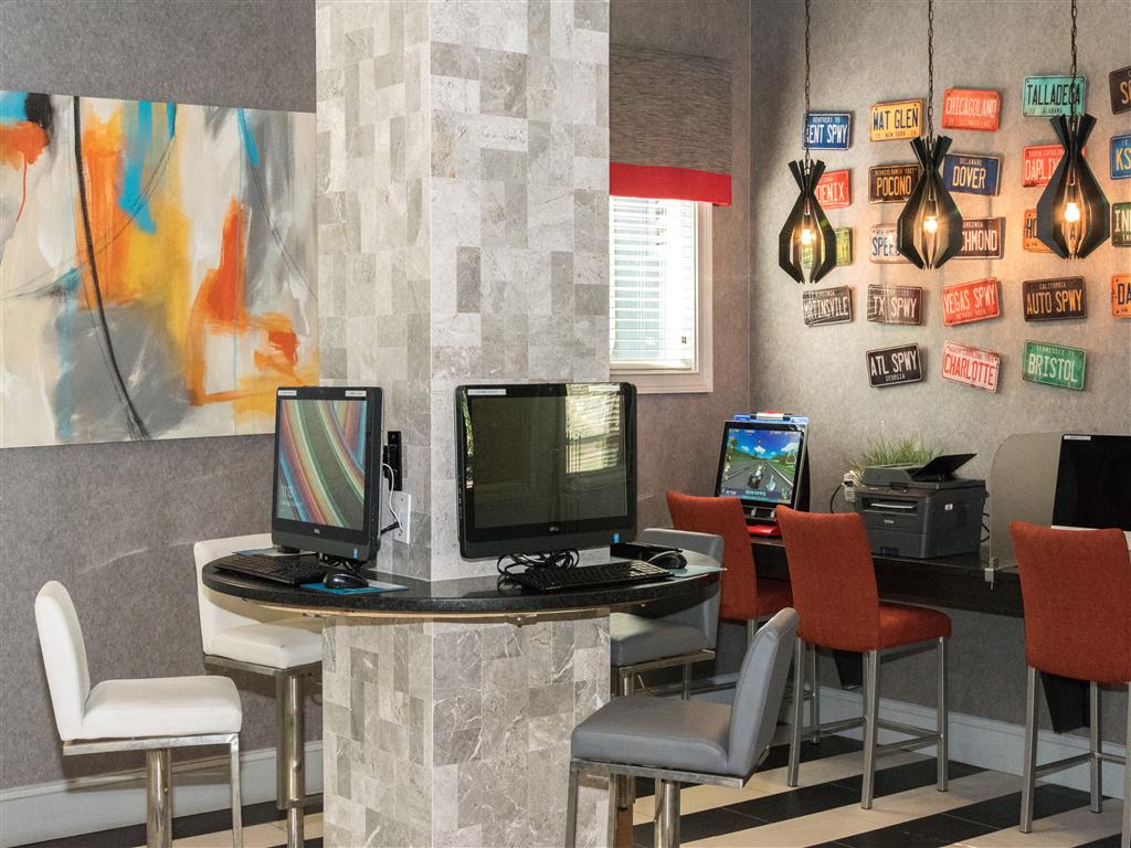 business center with computers and printers