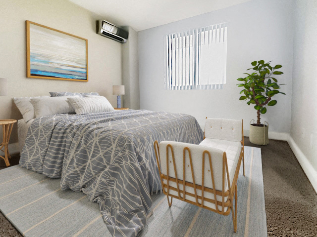 a bedroom with a bed and a chair and a plant