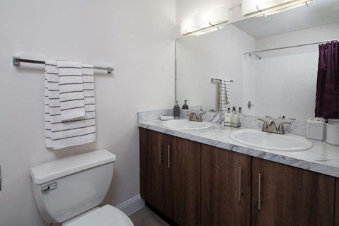 Spacious bathrooms with double sinks.