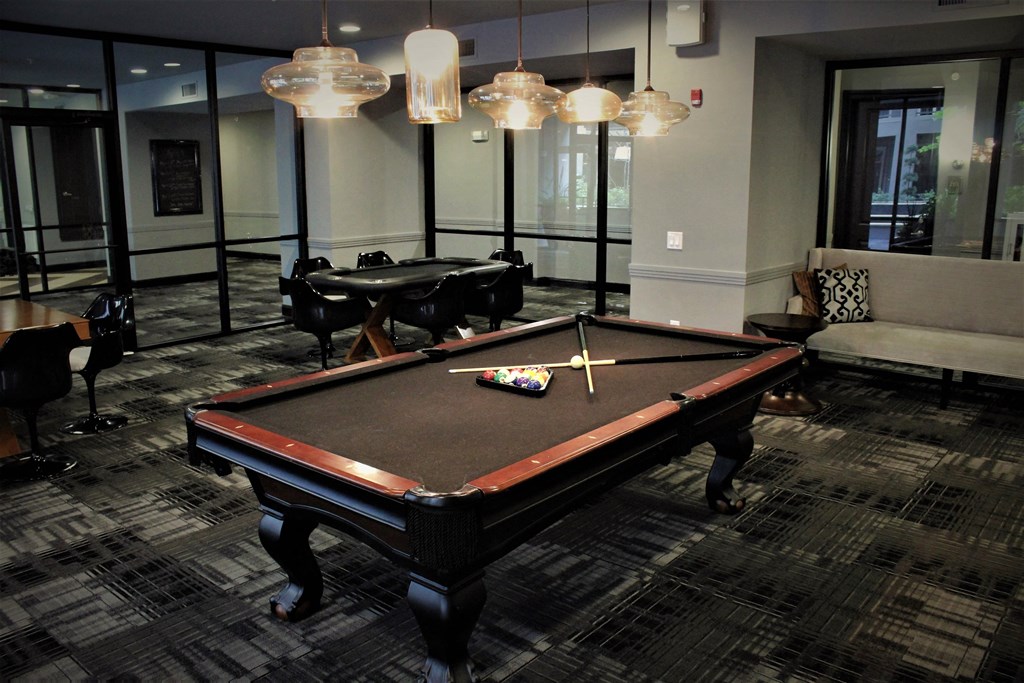 a billiards table in the lobby of a building