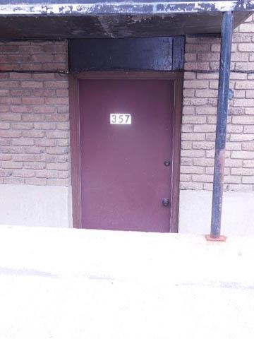 a red door with the number 87 on it