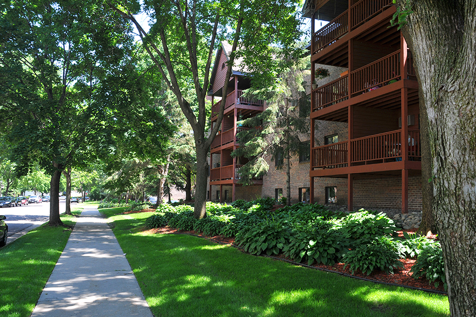 Outside apartment building with view of patio decks