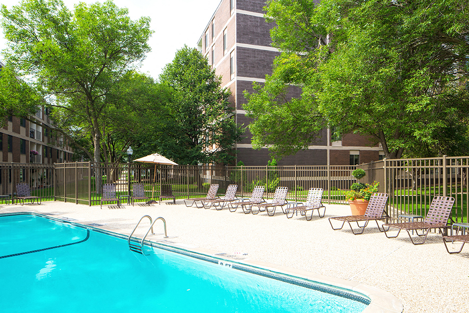 Outdoor pool with lounge chairs