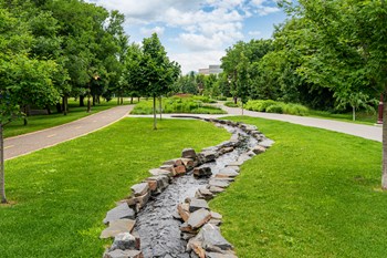 Stone water feature along a promenade/bike trail - Photo Gallery 23