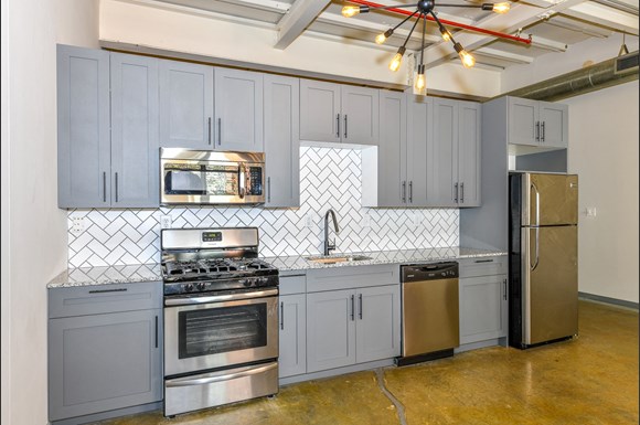 Canton Mill Lofts Apartments 550 Riverstone Parkway Ga Canton Photo Gallery 1 Stainless Steel Liances At Mill Lofts Apartments In Ga