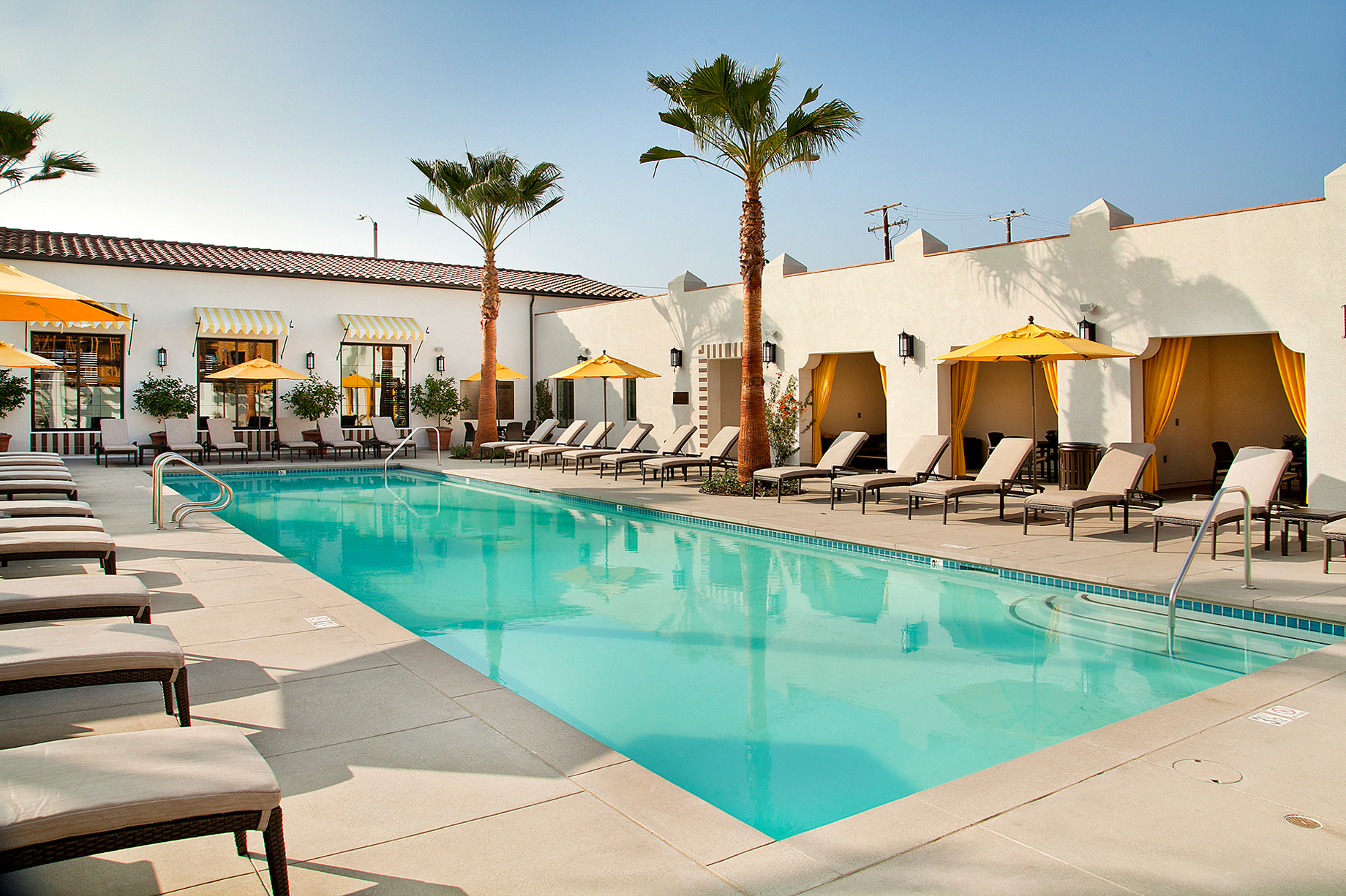 the pool at the courtyard at the ace hotel in palm springs