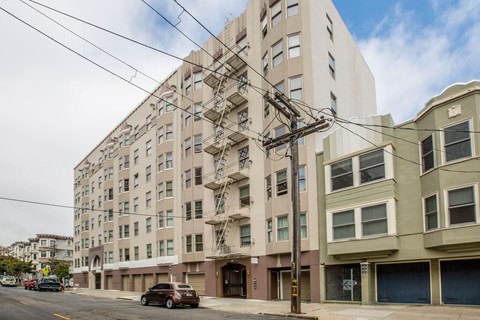 A large building with a fire escape on the side.