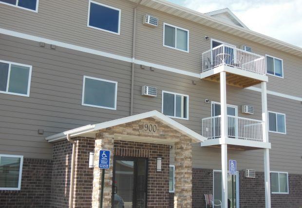 a building with two balconies on top of it