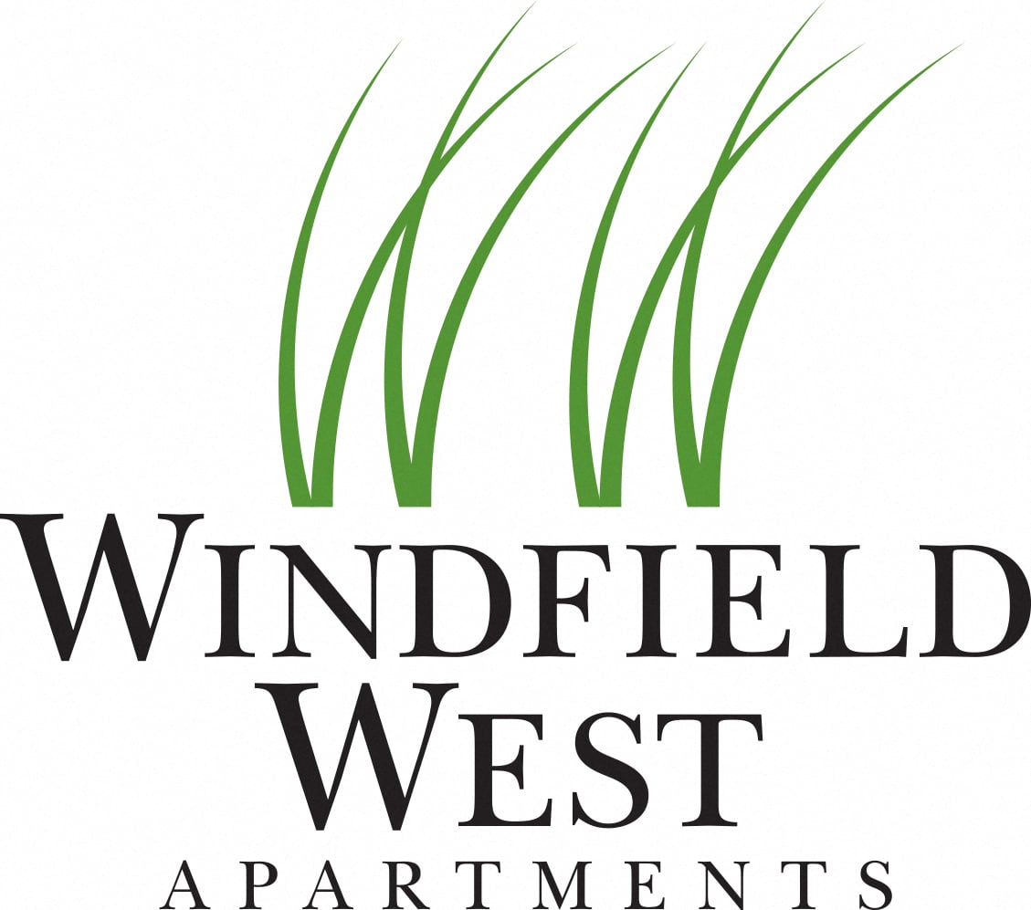 A logo for Windfield West Apartments featuring grass.