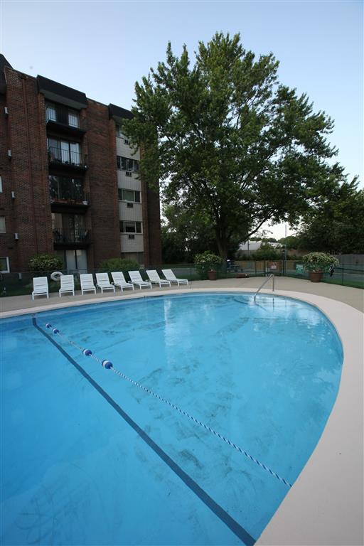 outdoor pool and lounge chairs