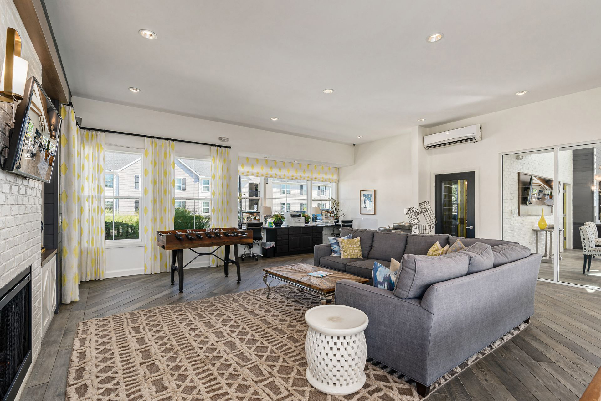 a living room with a couch and a table