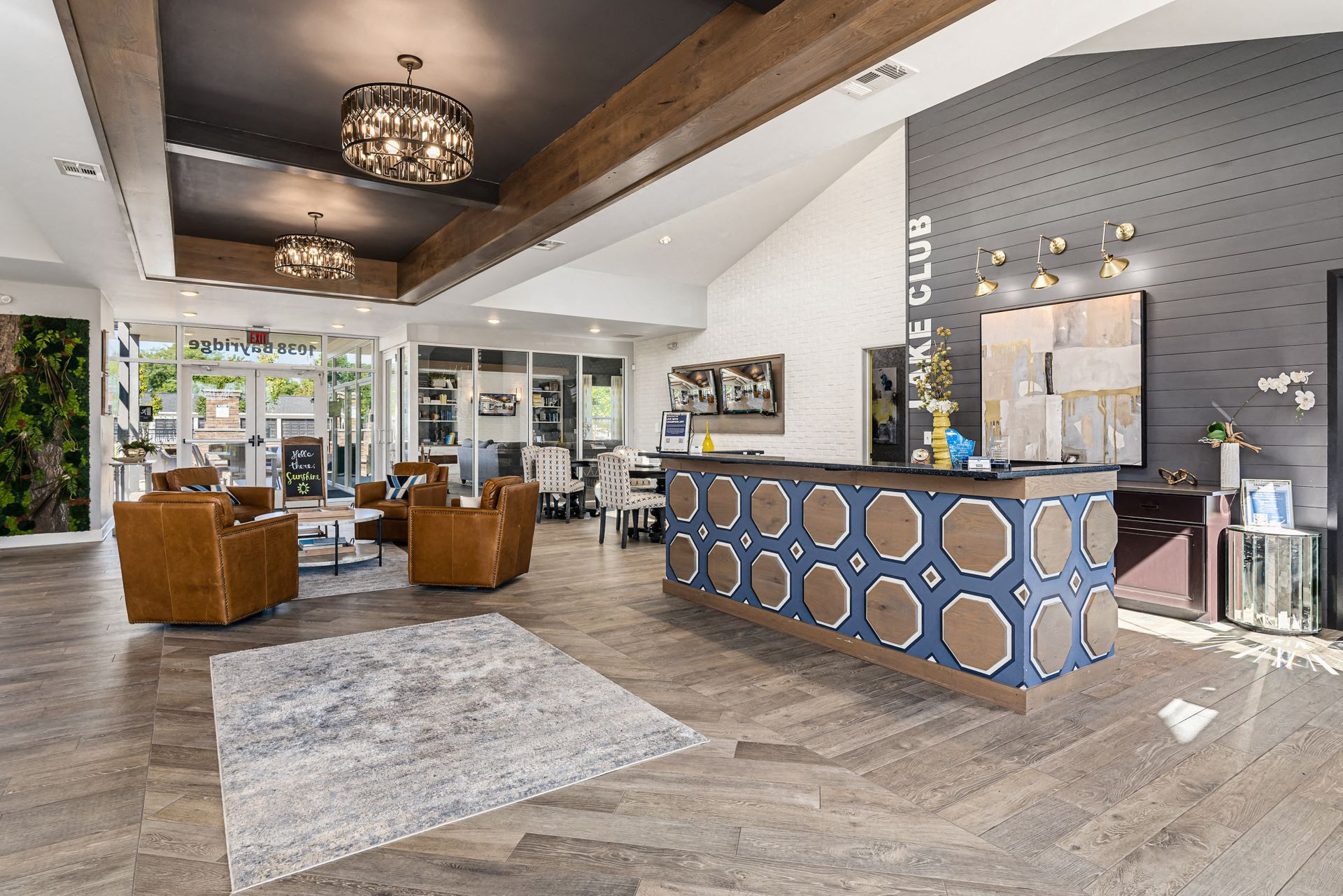 a lobby with furniture and a reception desk