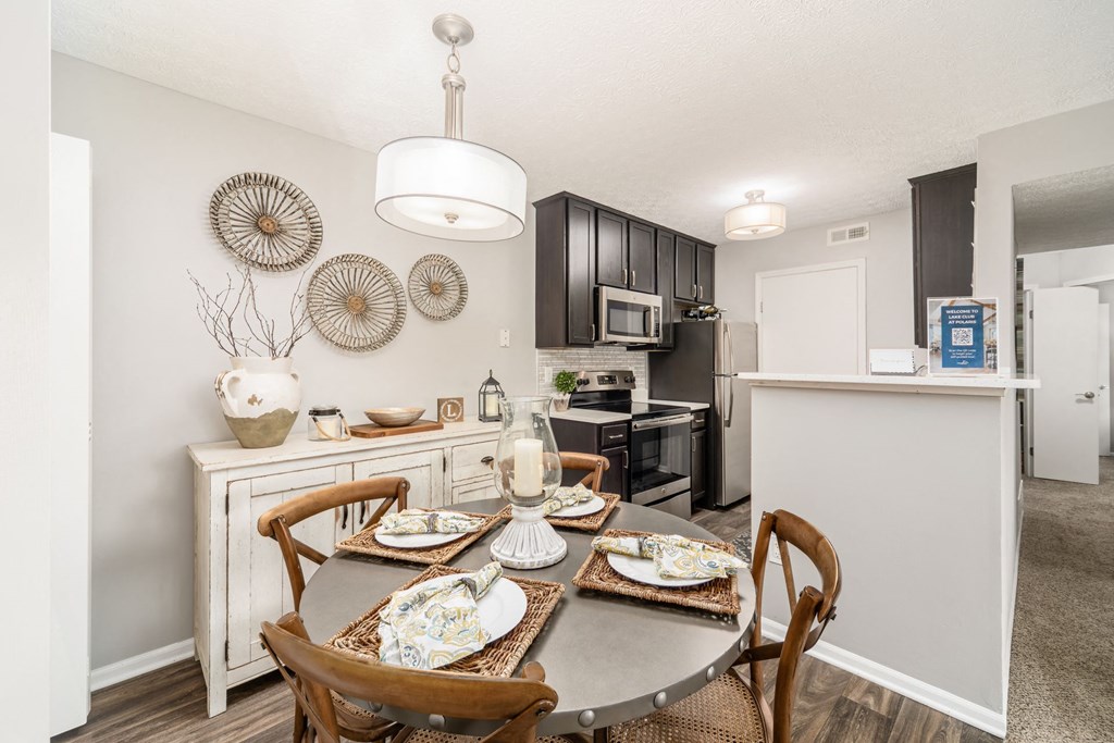 our renovated dining room and kitchen with a table and chairs