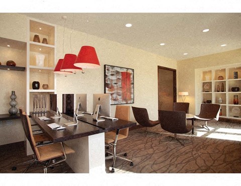 a conference room with a long desk and chairs