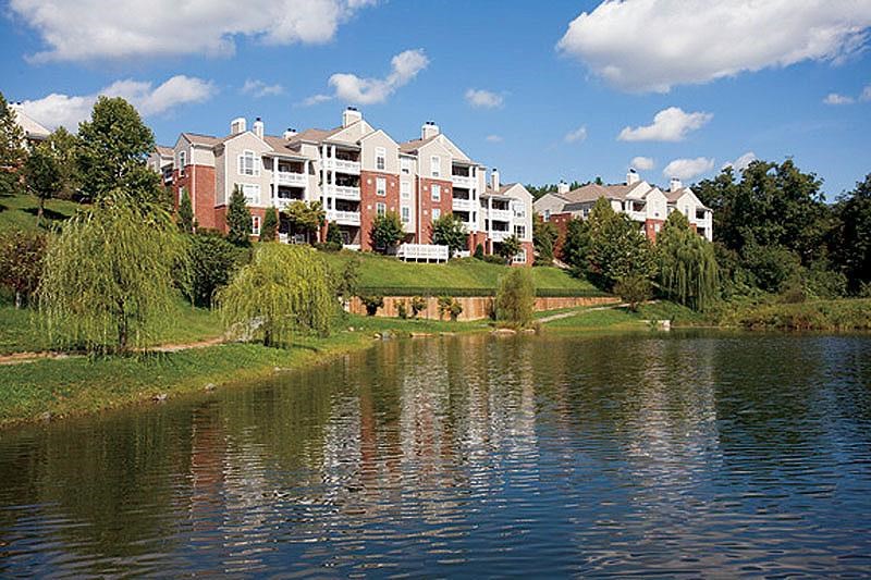 a body of water with buildings on the other side of it