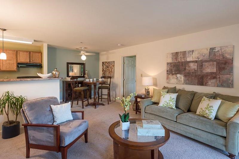 a living room with a couch and a table