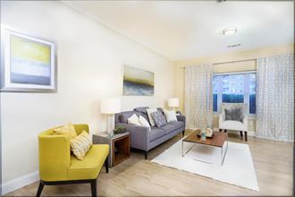 a living room with a couch and a table
