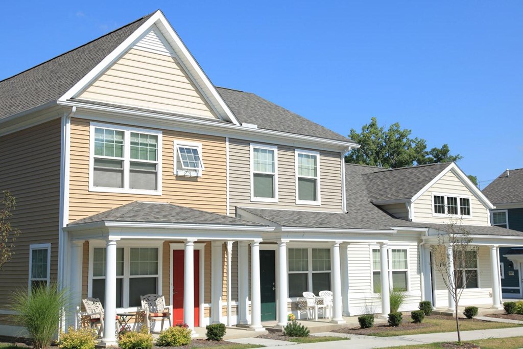 a house with a porch and a yard