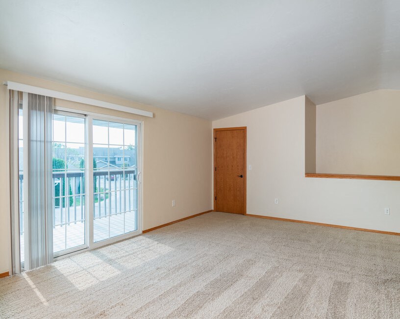 Large Living Area with Balcony and Extra Storage Closet