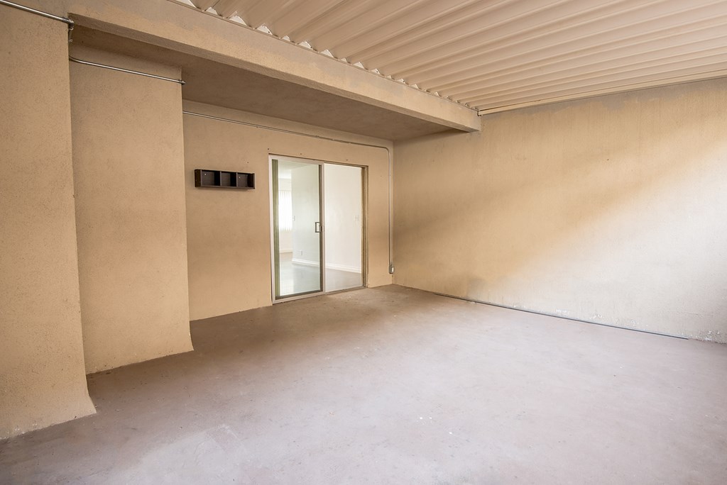 an empty room with a door in it