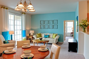 Bright living room at Prairie Point Apartments in Merrillville, IN - Photo Gallery 6