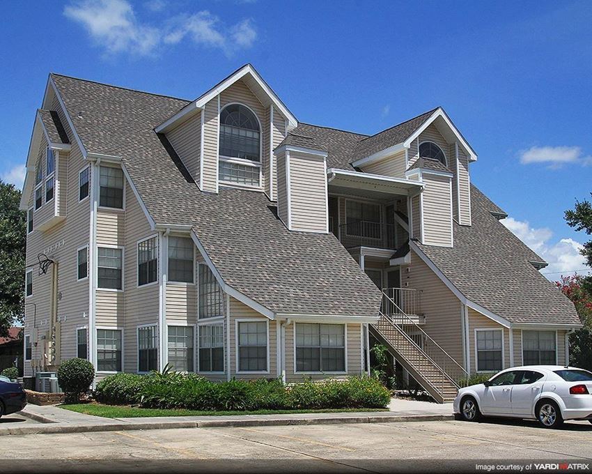 a house with a car parked in front of it