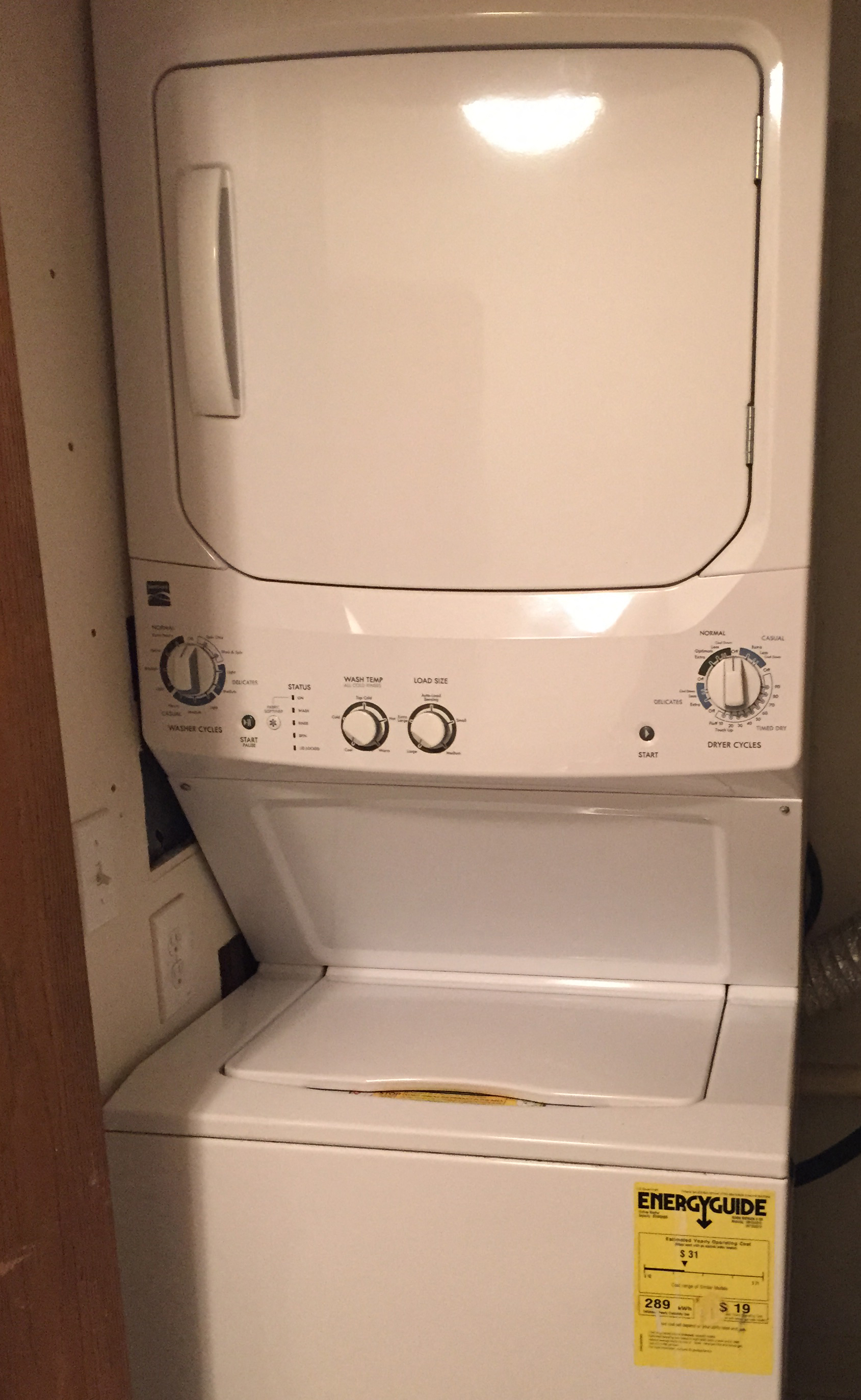 a white washer and dryer in a room