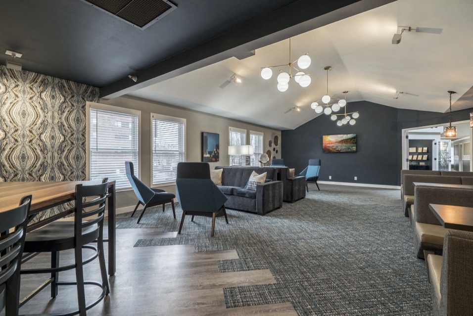 Community room with different kinds of chairs and tables