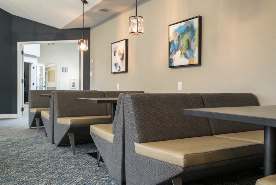 Booth seating and paintings on the walls