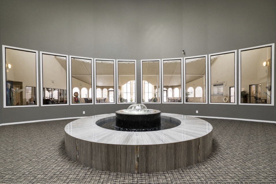 Water fountain surrounded by windows