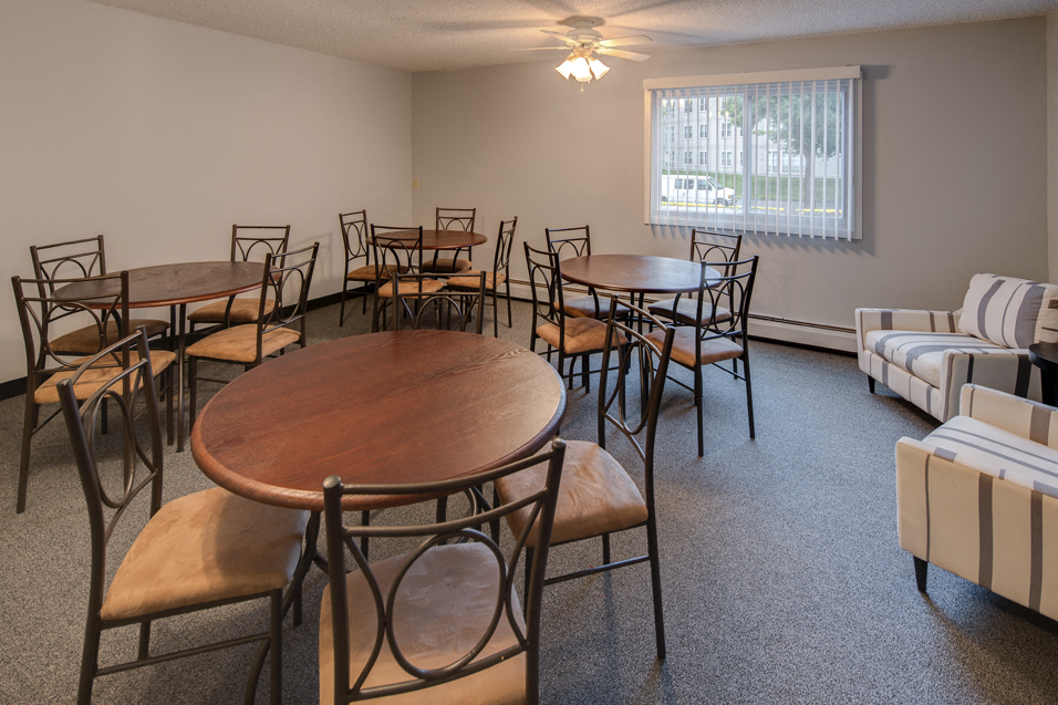Community room with tables and chairs