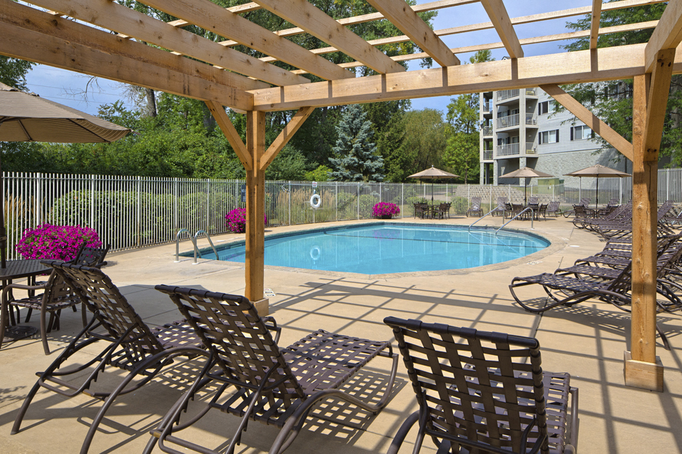 Outdoor pool with lounge chairs and sun terrace