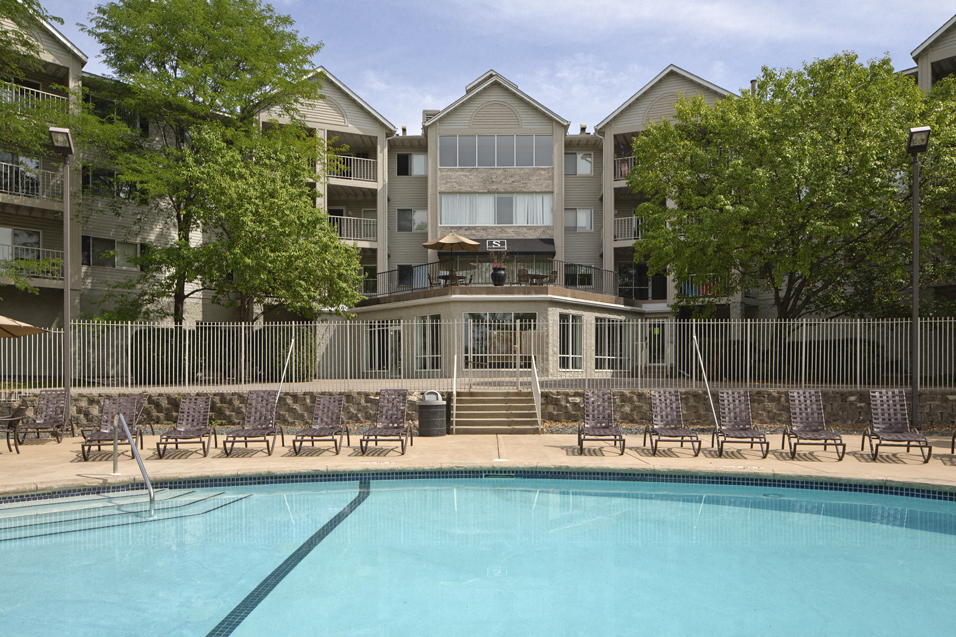 Outdoor pool with lounge chairs