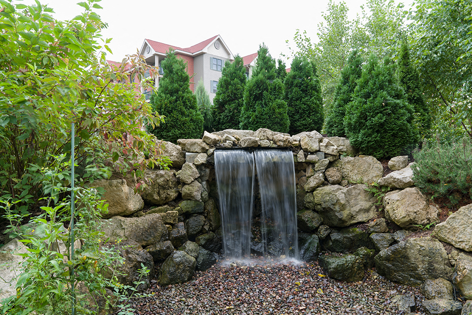 Stone water fountain in a garden