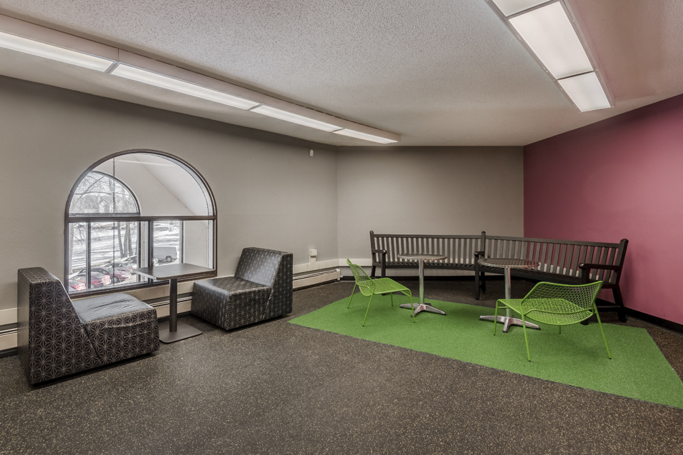 Business center with a variety of seating and tables