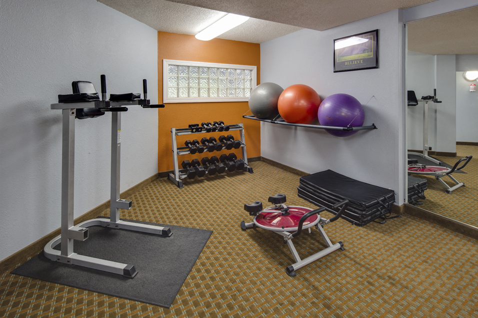 Fitness center with weights and yoga balls