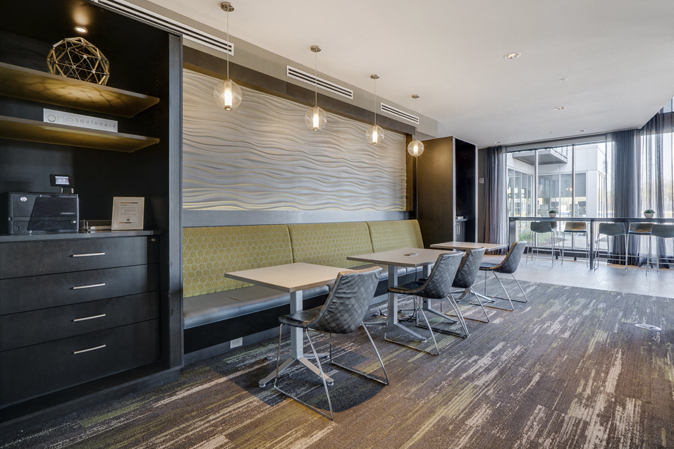 Cyber lounge with tables and a variety of seating