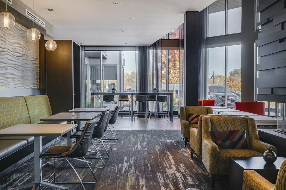 Cyber lounge with tables and a variety of seating