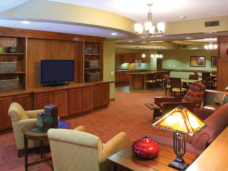 a living room with furniture and a television