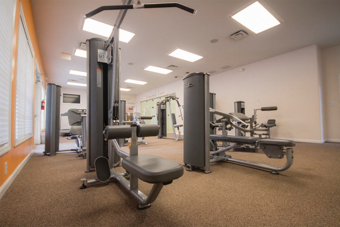 a gym with weights and other exercise equipment