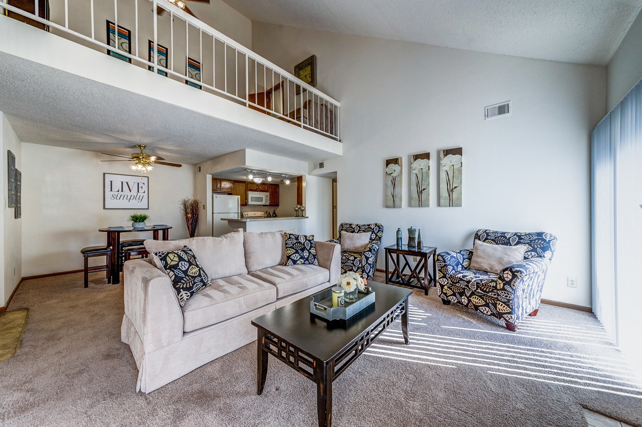 a living room with a couch and a coffee table