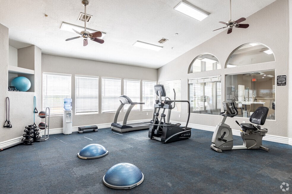 the gym at the district flats apartments in lenexa
