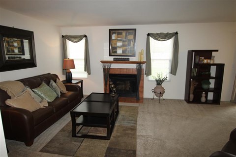 a living room with a couch and a coffee table